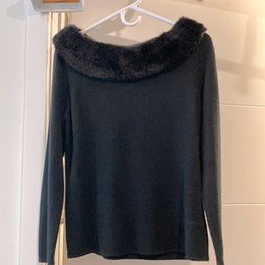 Women’s dressy sweater.